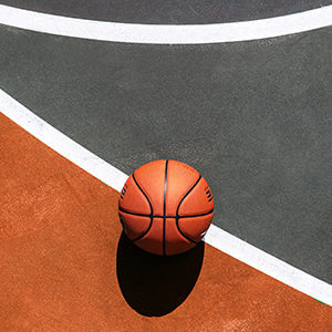 Basket ball on a basket court