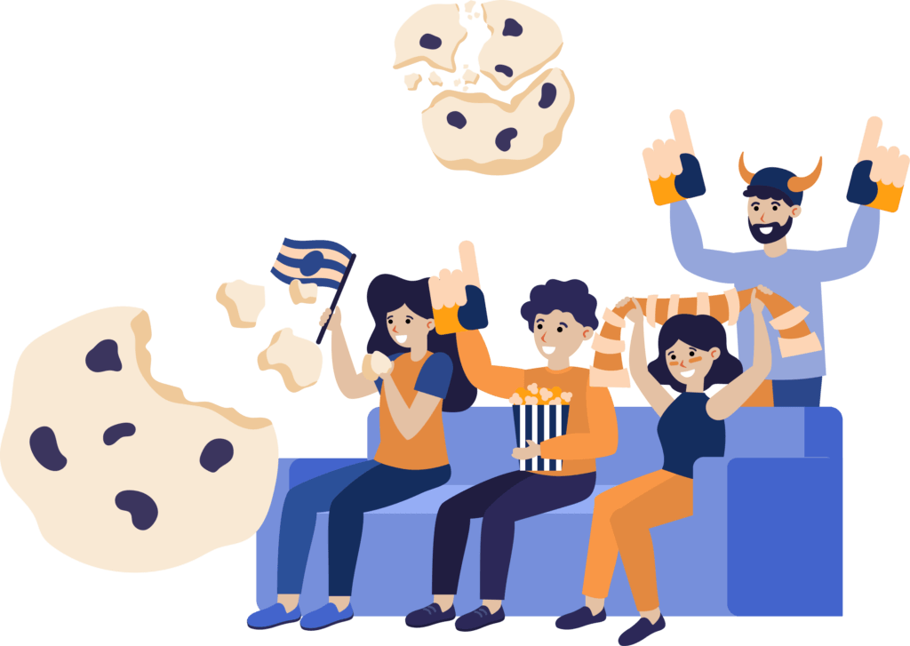A group of fans cheering on their team from their couch surrounded by huge cookies