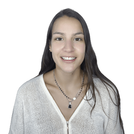 A headshot of Maria Caicedo Cabrera smiling directly at the camera